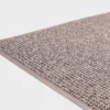 VM-Carpet-Tweed-39-harmaa Harmaa VM Carpet Tweed matto. Lähikuva maton kulmasta, josta näkyy kanttaus ja maton materiaali.